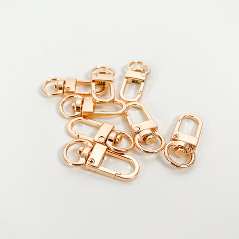 Rotating carabiner clasp platinum gold